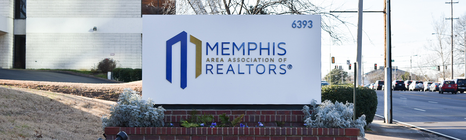 Sign with MAAR Logo in Front of MAAR Building