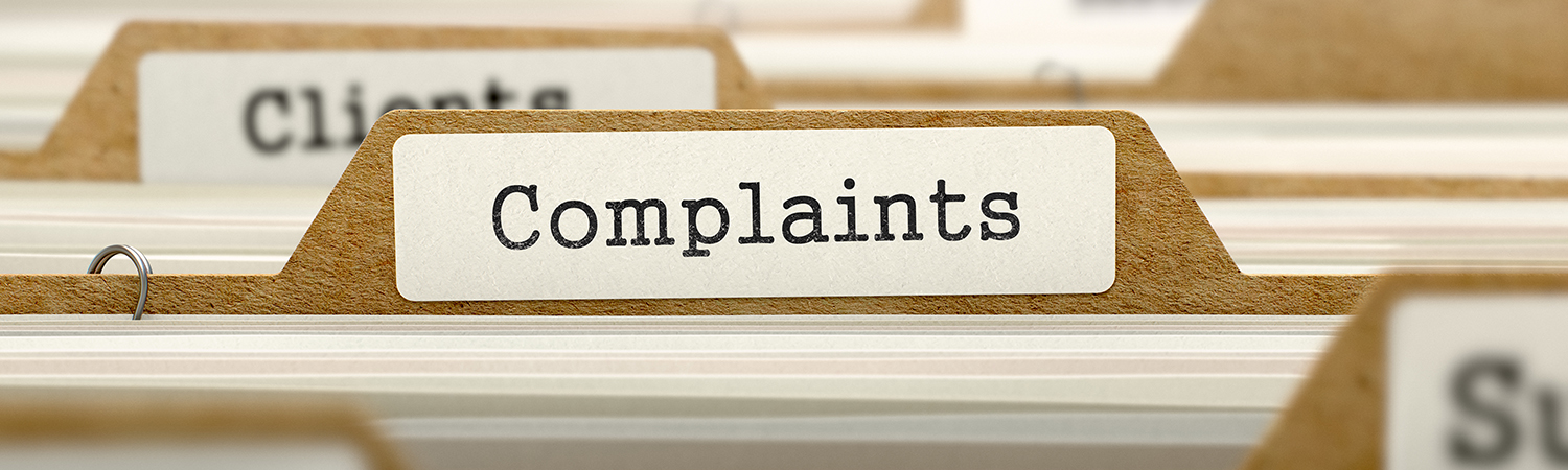 Close-up of File Folder Labeled 'Complaints'